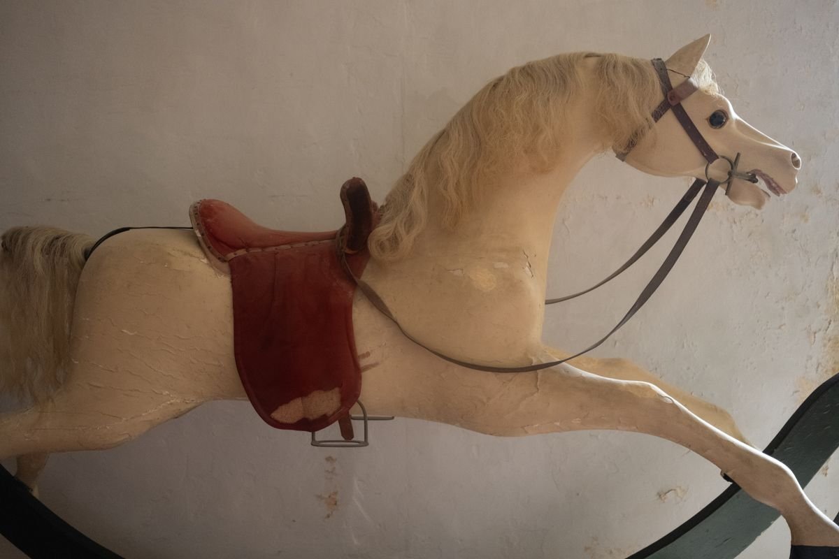 A hand-finished vintage wooden rocking horse